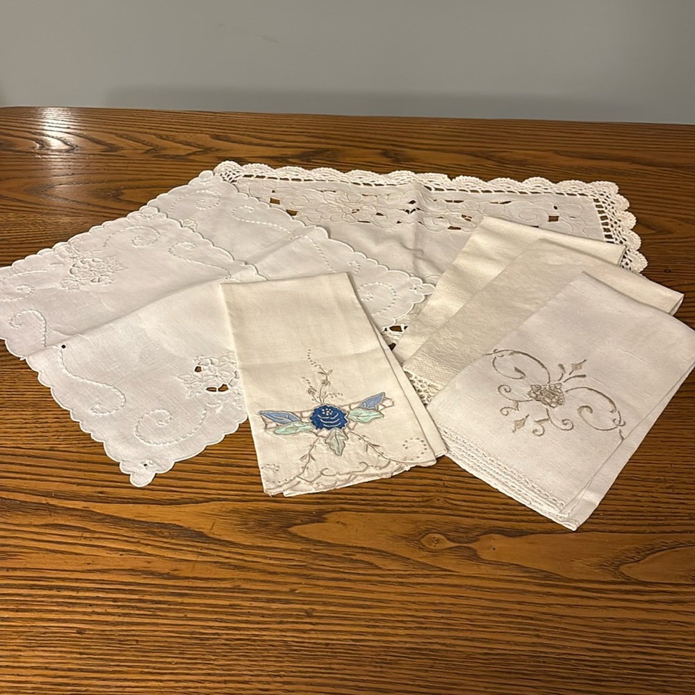 Lot of vintage linens. 11 doilies/ guest/hand towels. Hand-embroidered/stitched.